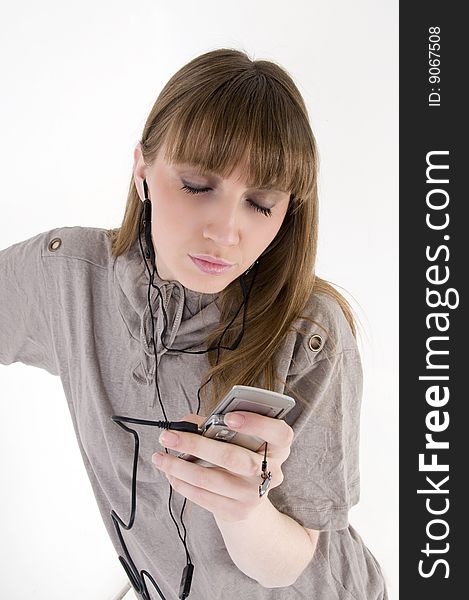 Female Model With Cellphone And Headphones