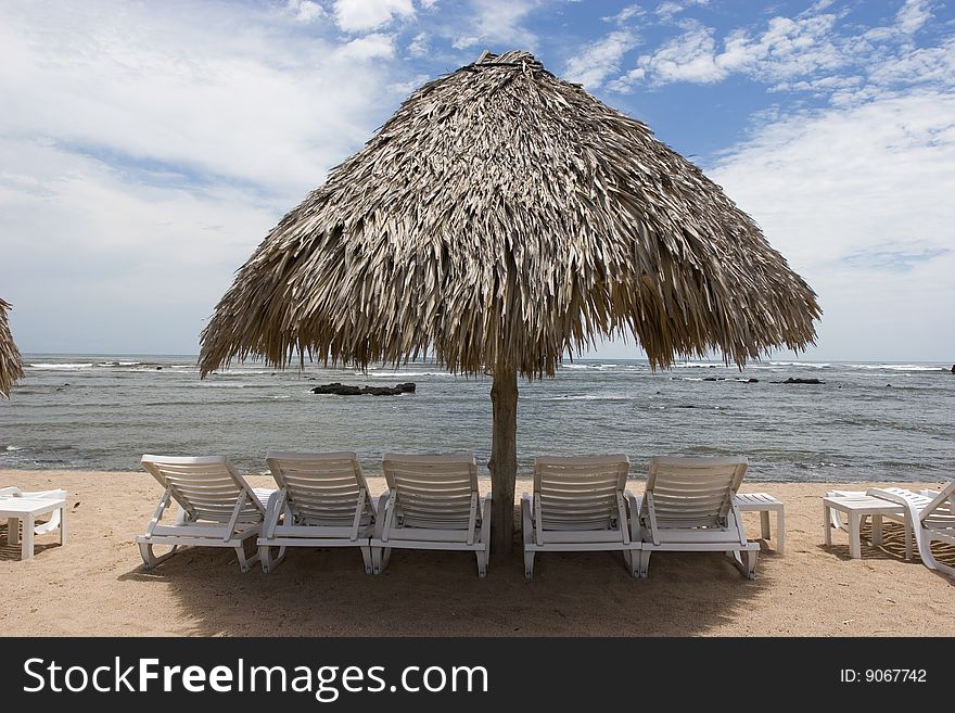 A cabana at a beach side resort. A cabana at a beach side resort