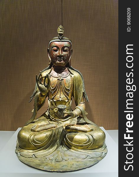 Golden copper buddha statue from china.