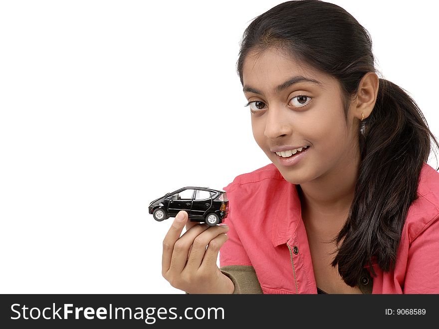 Young Girl Holding Car