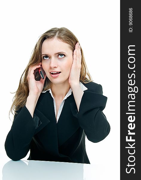 Young business lady has conversation by phone. Young business lady has conversation by phone