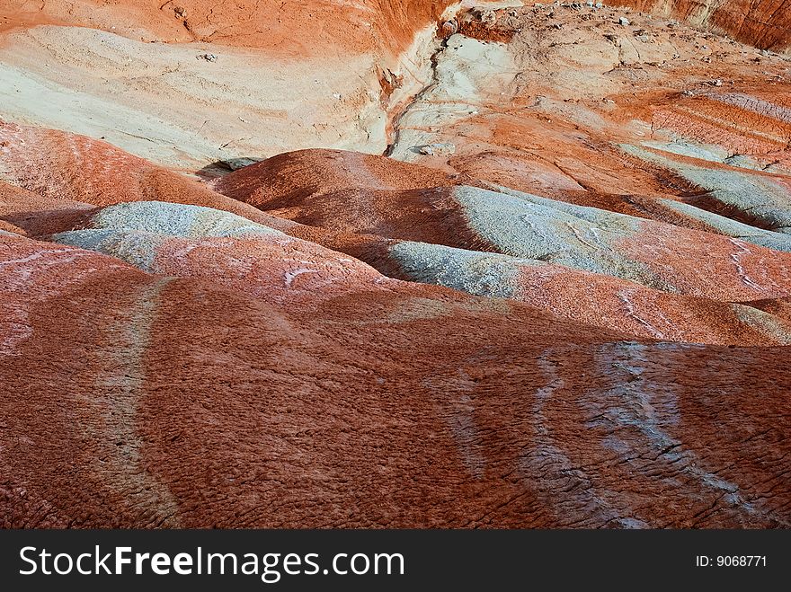 Cracked and dried red earth. Cracked and dried red earth