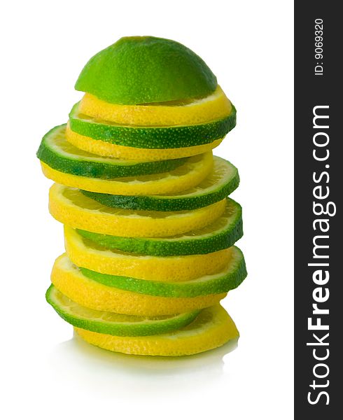 Sliced green and yellow limes shallow, isolated. Sliced green and yellow limes shallow, isolated