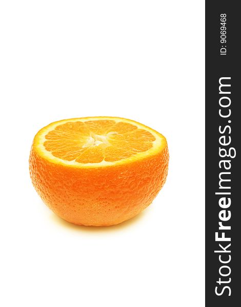 Half of tangerine isolated on white. Half of tangerine isolated on white.