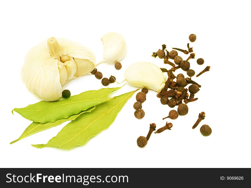 Pile of spices isolated on white. Pile of spices isolated on white.