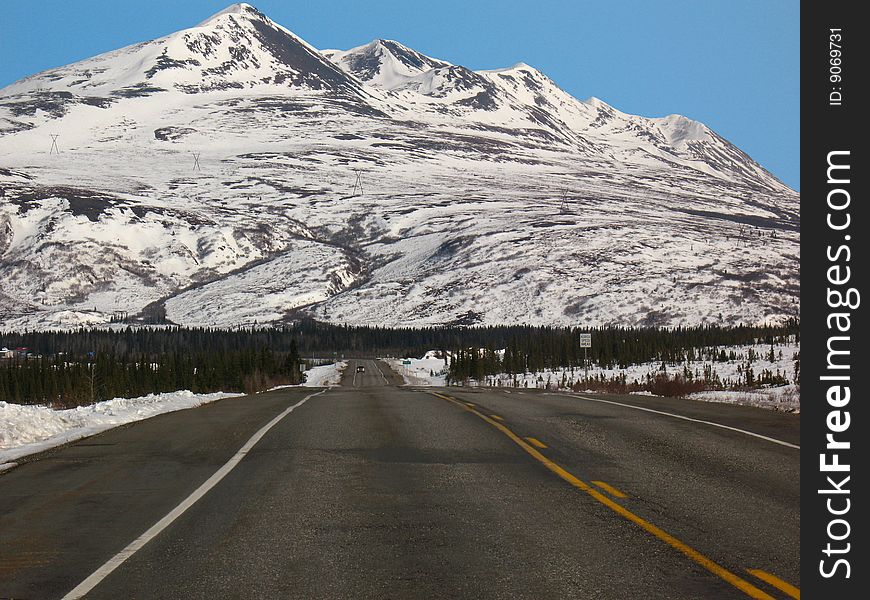 Five peaks lined up in the Alaska Range near Cantwell, Alaska. Five peaks lined up in the Alaska Range near Cantwell, Alaska.