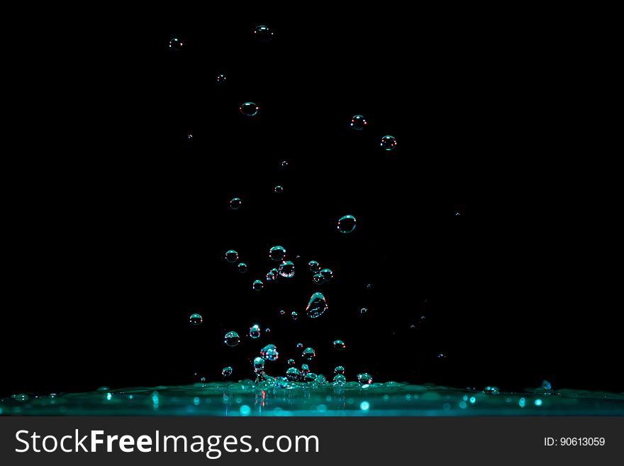 Close-up Of Water Splashing Against Black Background