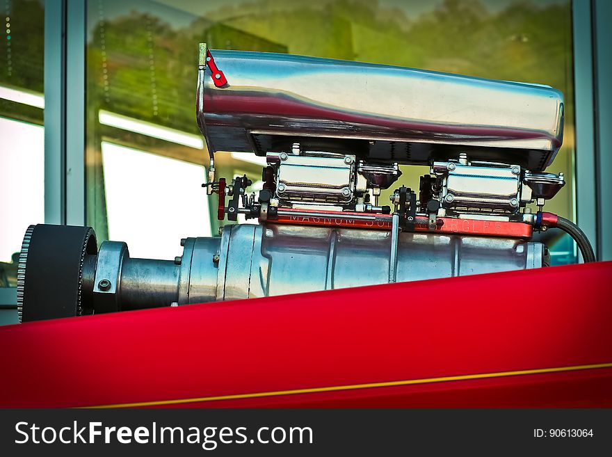 Close-up View of Red And Silver Engine