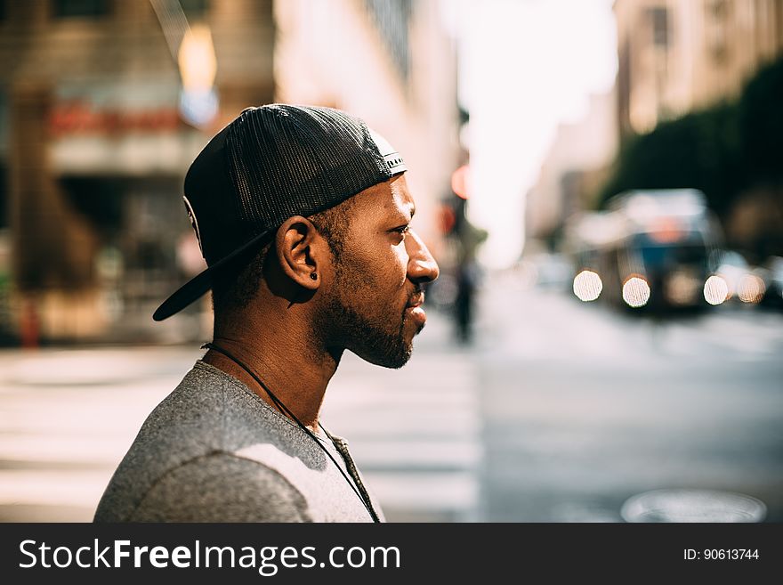 Man Wearing Cap Back To Front