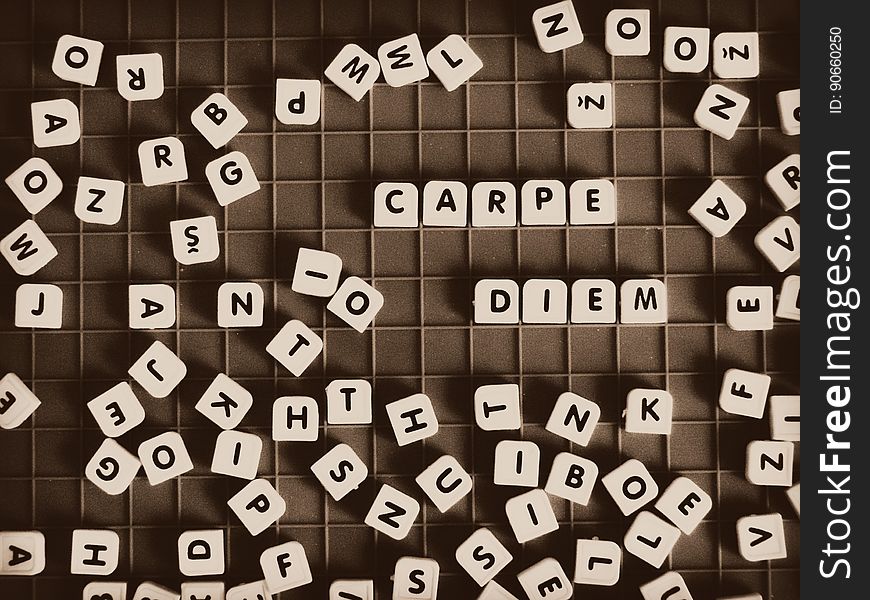 A word block game with the words "carpe diem" for "seize the day".