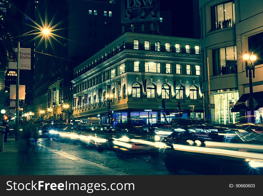 Blur of headlights from traffic on streets in city at night. Blur of headlights from traffic on streets in city at night.