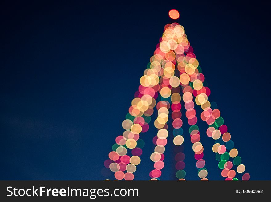 Bokeh colorful christmas tree lights at night. Bokeh colorful christmas tree lights at night.