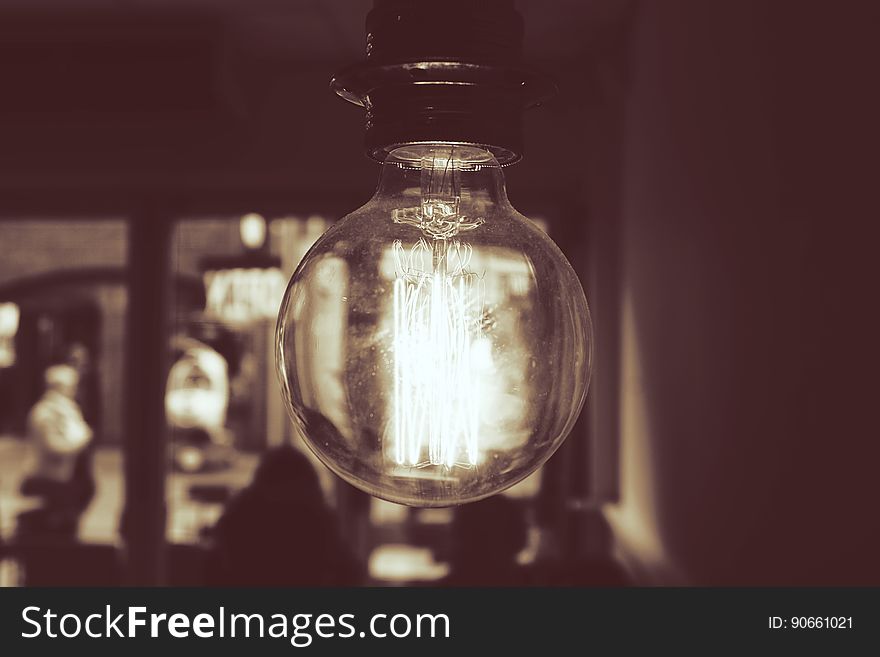 Vintage lamp in glass case in black and white.