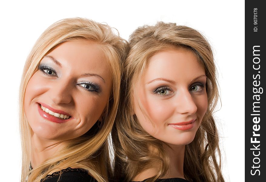 Portrait of similar sisters isolated over white with clipping path