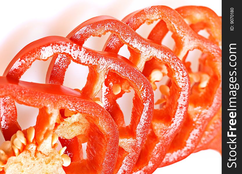Sliced red pepper isolated on white