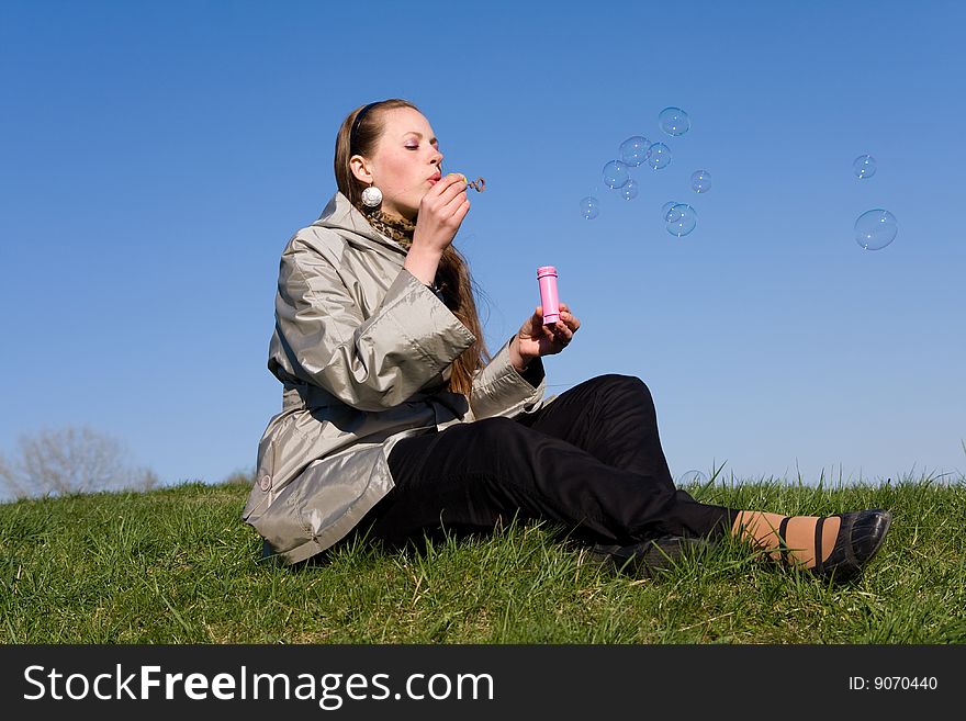 Girl Makes Soap Bubble