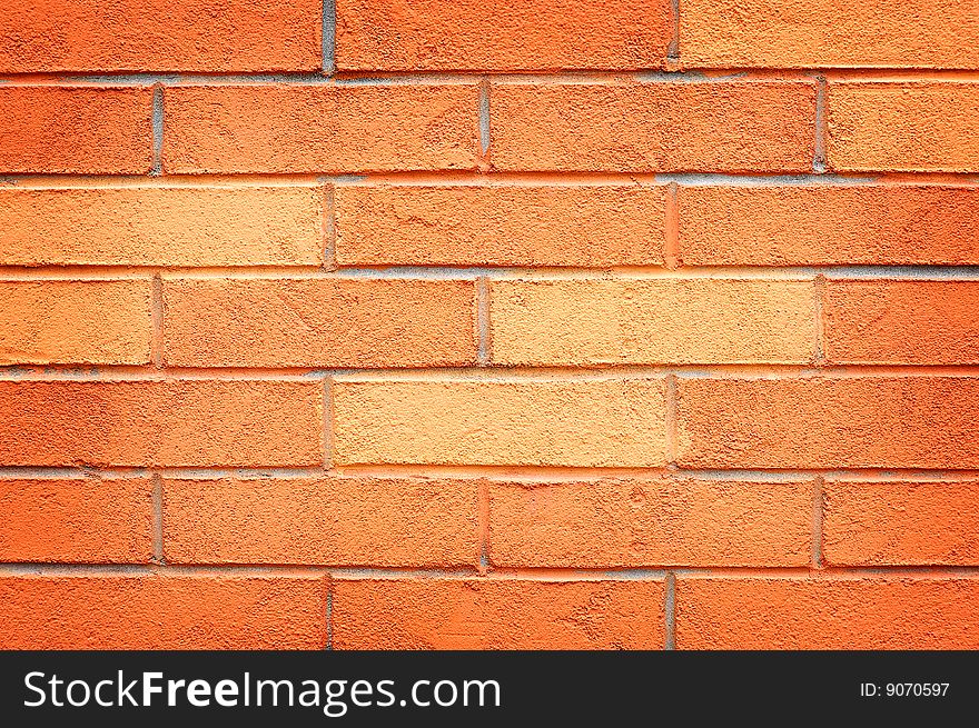 Orange bricks in the wall. Can be used as background