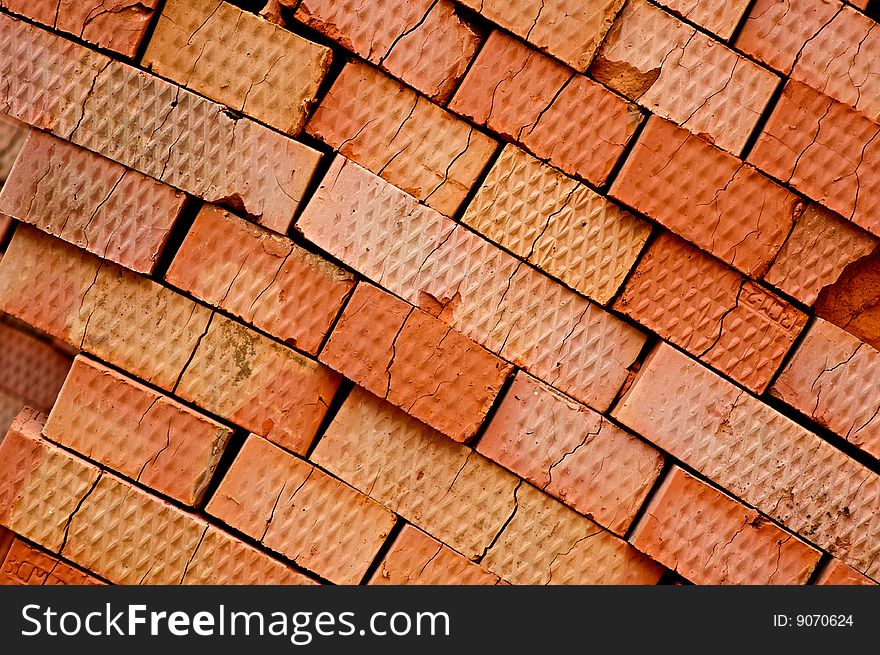 Orange cracted bricks. Can be used as background