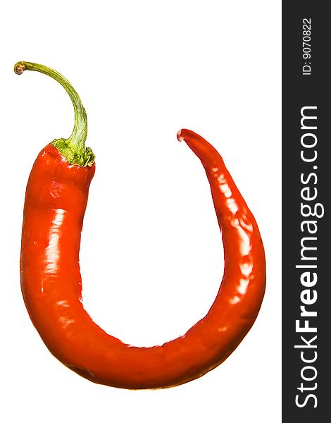 Fresh red hot pepper over white.