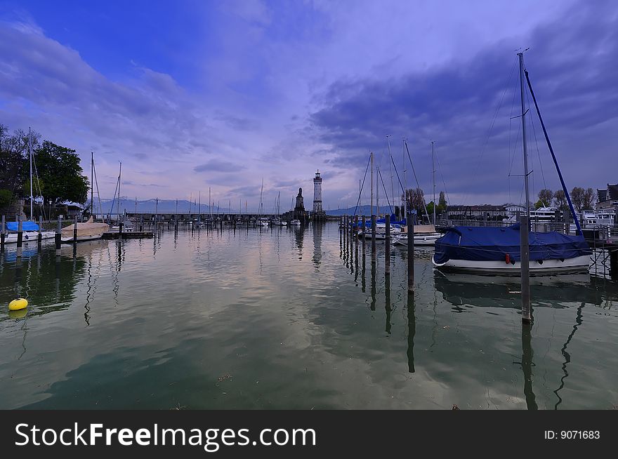View of the famous harbour of Lindau, bavarian Town at Lake Constance, Germany, near Austria and Switzerland. View of the famous harbour of Lindau, bavarian Town at Lake Constance, Germany, near Austria and Switzerland