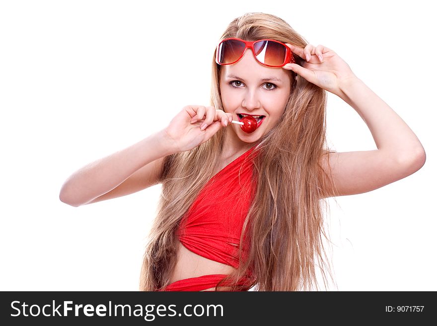 Woman in a red dress with the glasses on a white background