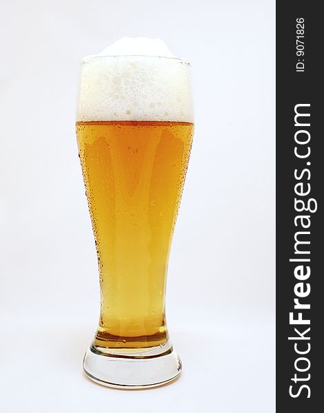 Glass of wheat beer isolated. Glass of wheat beer isolated