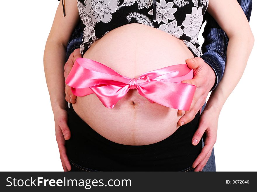 Pregnant woman with husband. Gift. Isolated