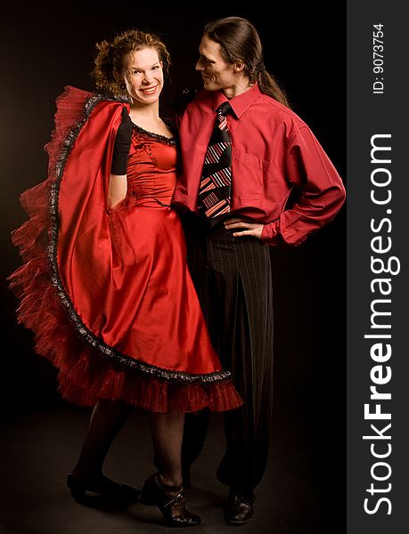 Couple in red dance costumes
