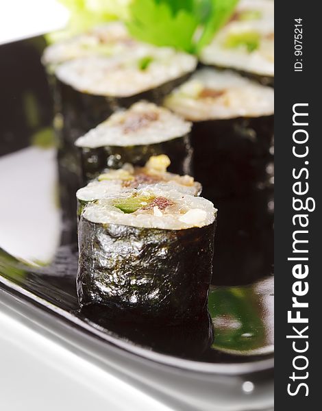 Japanese Cuisine - Sushi with Salad Leaf and Parsley