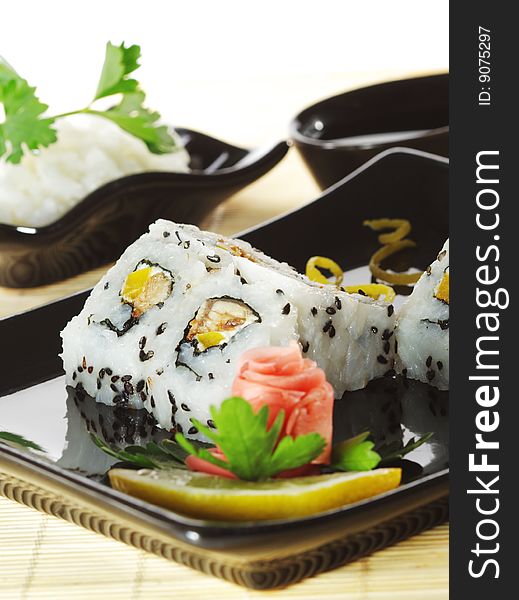 Japanese Cuisine - Sushi with Salad Leaf and Parsley