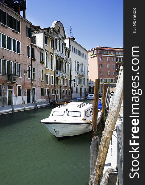 Venice channel with bridge and boats in the summer. Venice channel with bridge and boats in the summer