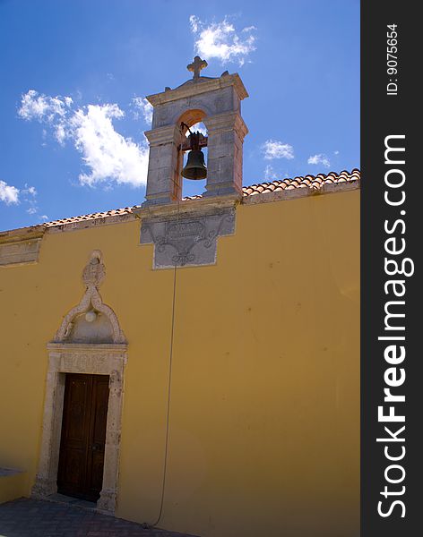 Door and bell of Church in Crete. Door and bell of Church in Crete