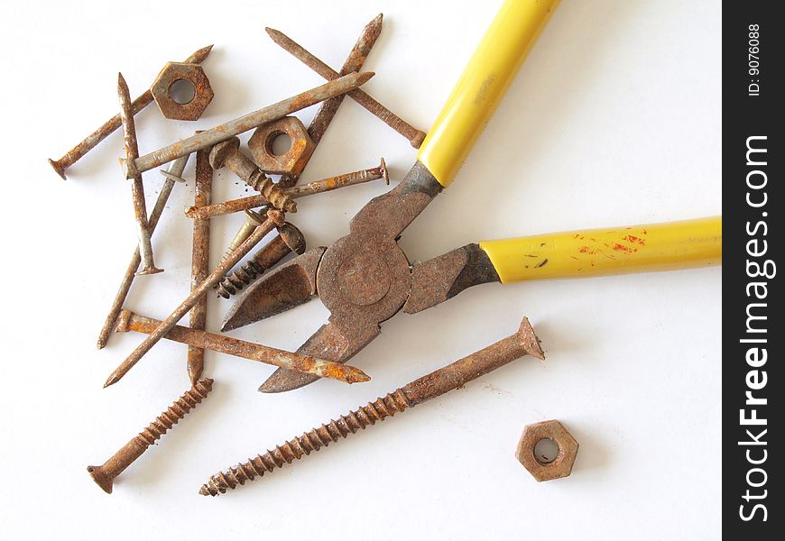 Rusty tools, screws, nails, nuts and bolts. Rusty tools, screws, nails, nuts and bolts.