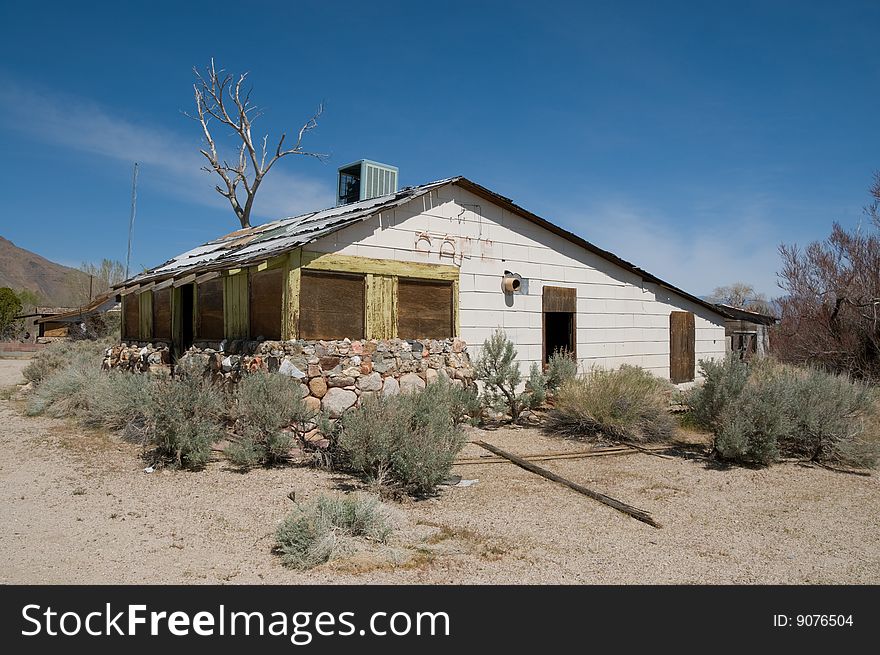 A boarded up cafe near Olancha California.