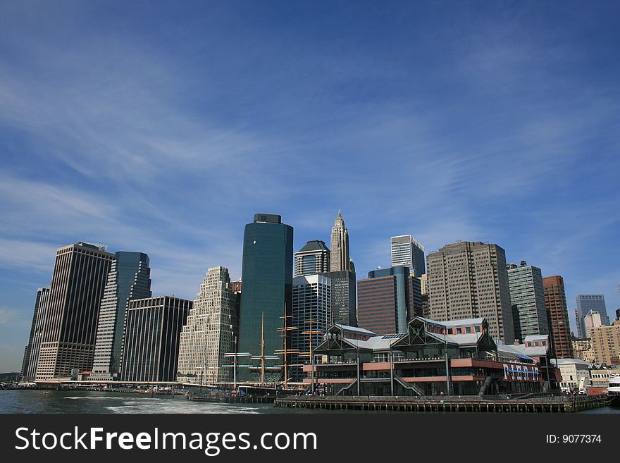 Lower Manhattan skyline along the Eeat River (includes the South Street Seaport). Lower Manhattan skyline along the Eeat River (includes the South Street Seaport).