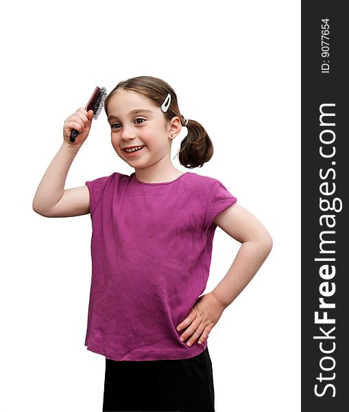 Cute seven years girl with pigtails brush her hair on white background. Cute seven years girl with pigtails brush her hair on white background