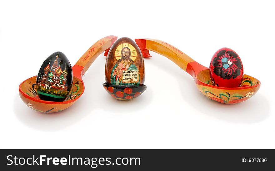 Easter eggs in Russian wooden painted spoons