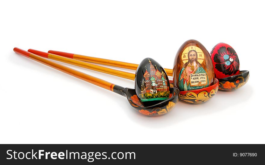 Easter eggs in Russian wooden painted spoons