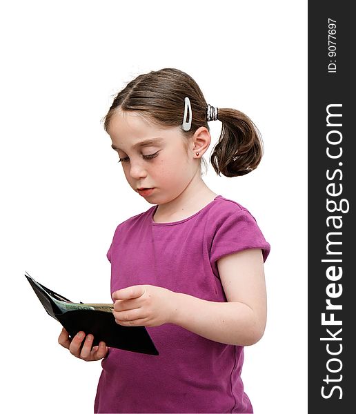 Serious seven years girl with pigtails holds a wallet with money. Serious seven years girl with pigtails holds a wallet with money