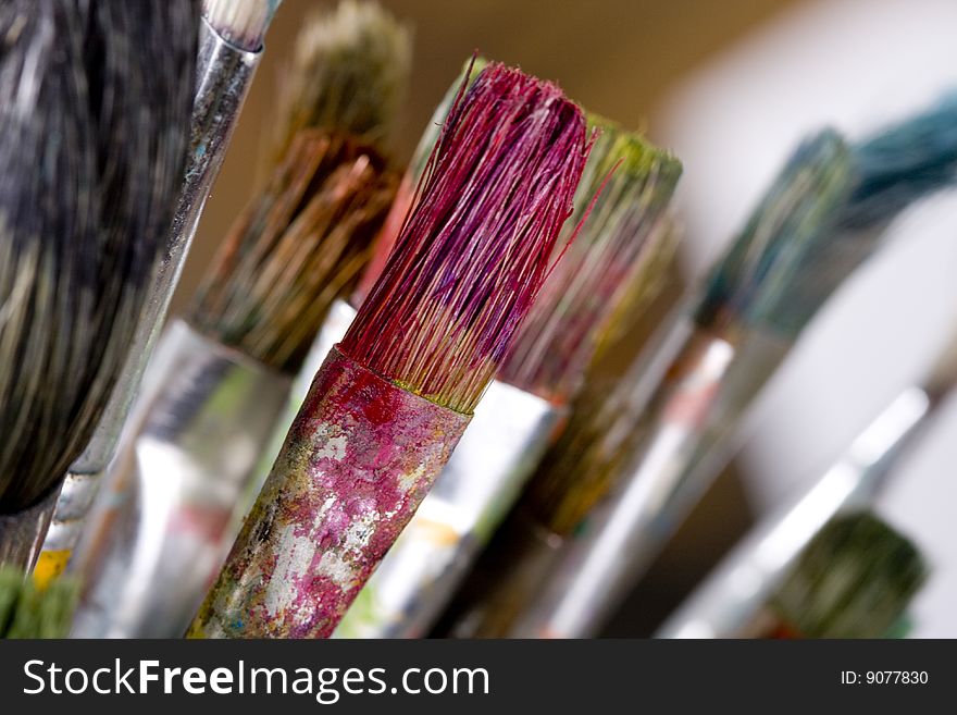 Painting brushes in artist studio