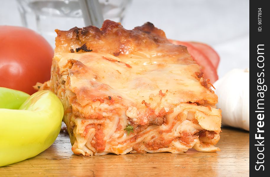 Meat lasagna with fresh fruit