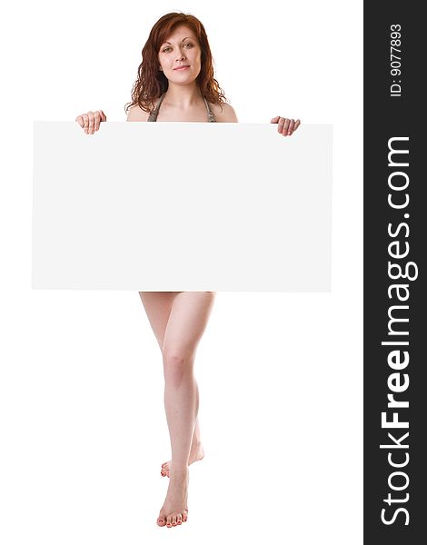 Undressed girl with a clean sheet in hands isolated on a white background. Undressed girl with a clean sheet in hands isolated on a white background