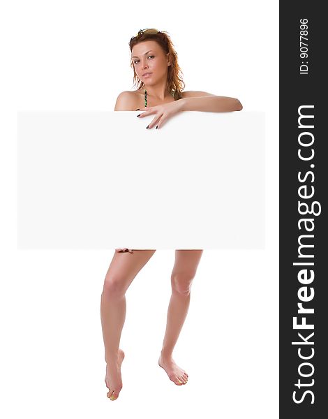 Undressed girl with a clean sheet in hands isolated on a white background