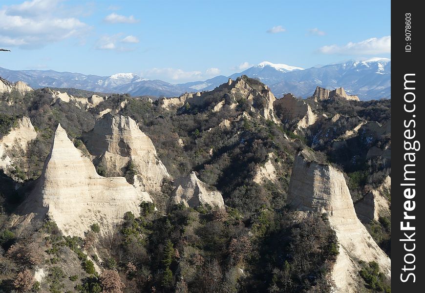 Nice view of rocky scenery with blue sky and mountains, Melnik, Bulgaria. Nice view of rocky scenery with blue sky and mountains, Melnik, Bulgaria