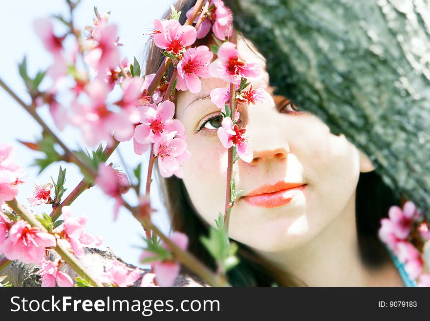 Young girl in spring garden