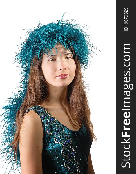Beautiful woman with blue boa on a head on white background