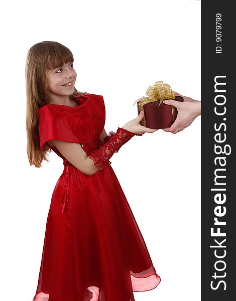 Beautiful girl with present. Little girl gets gift.  Attractive female is holding purple box with gold ribbon. Attractive lady is surprising at present. Isolated over white background. Schoolgirl feels shy. Beautiful girl with present. Little girl gets gift.  Attractive female is holding purple box with gold ribbon. Attractive lady is surprising at present. Isolated over white background. Schoolgirl feels shy.