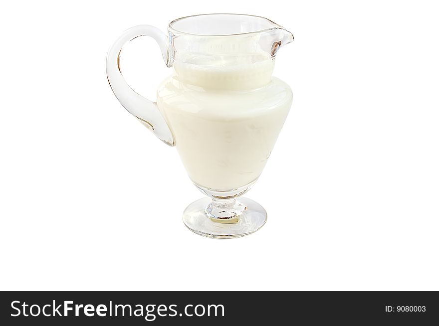 Pitcher Of Milk Isolated Over White.