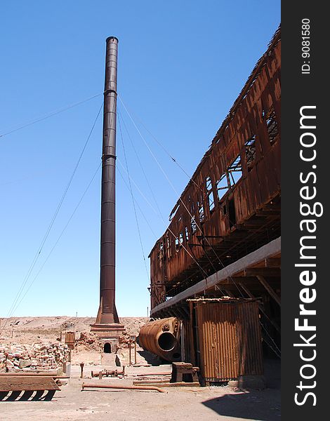 Smoke stack in the abandoned Santa Laura nitrate mine near Iquique in the Atacama desert of northern Chile