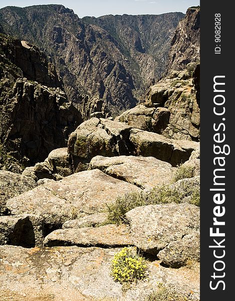 A scenic view from the rim of the Black Canyon of the Gunnison. A scenic view from the rim of the Black Canyon of the Gunnison